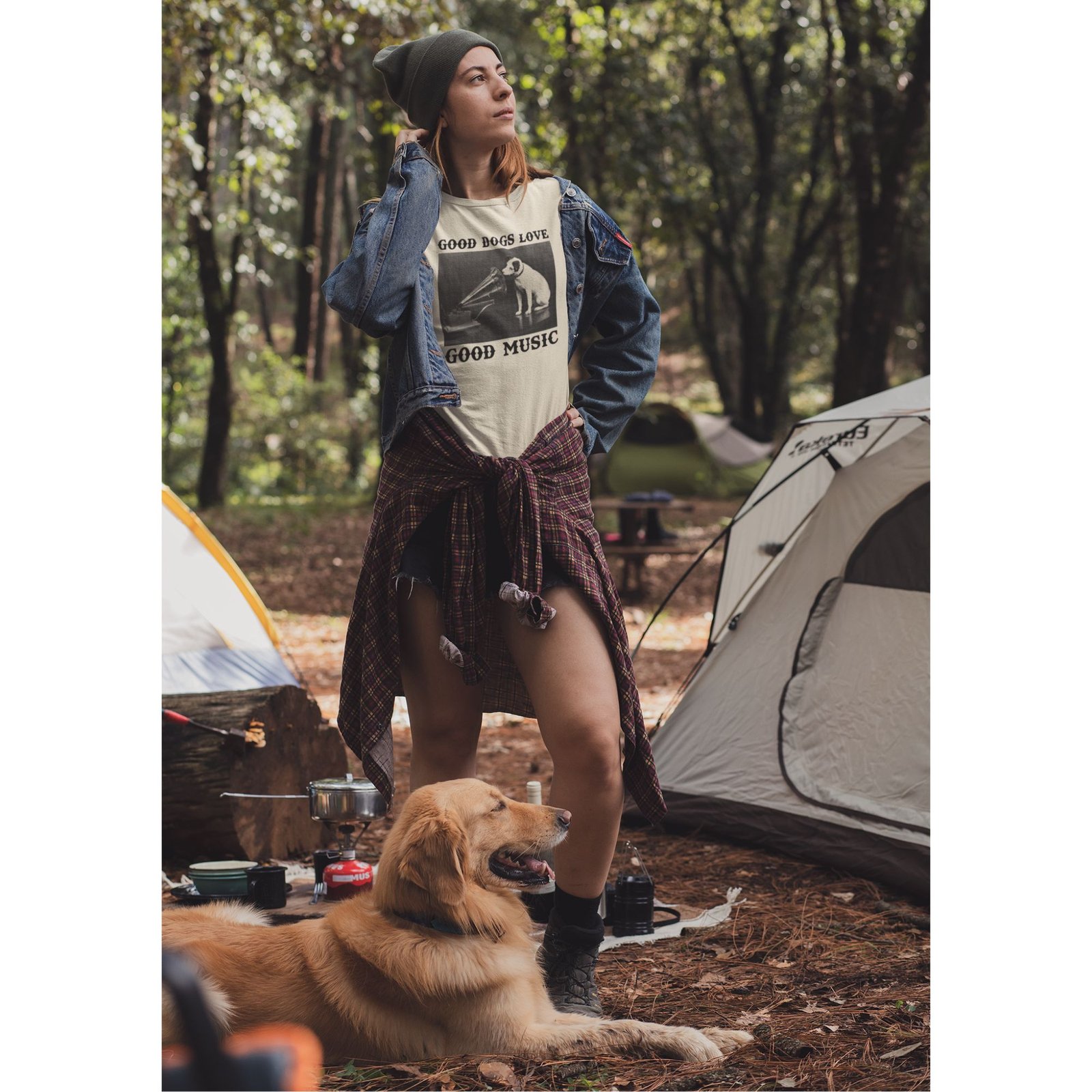 Woman wearing Frontier Rogue Good Dogs Love Good Music graphic tee with dog in outdoor setting