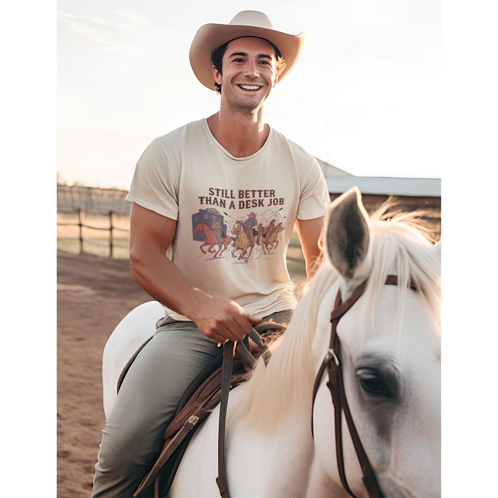 Man wearing Frontier Rogue Still Better Than a Desk Job graphic tee on horse in outdoor western setting