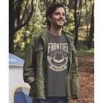 Man wearing Frontier Rogue Cream Logo Tee in Pepper in Nature