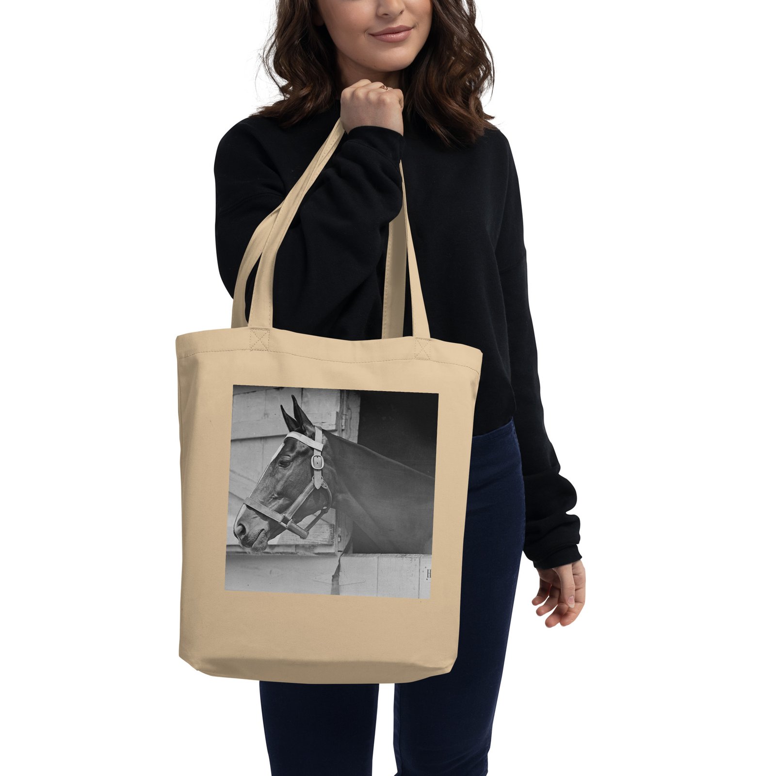 Frontier Rogue The Mustang tote bag held by woman
